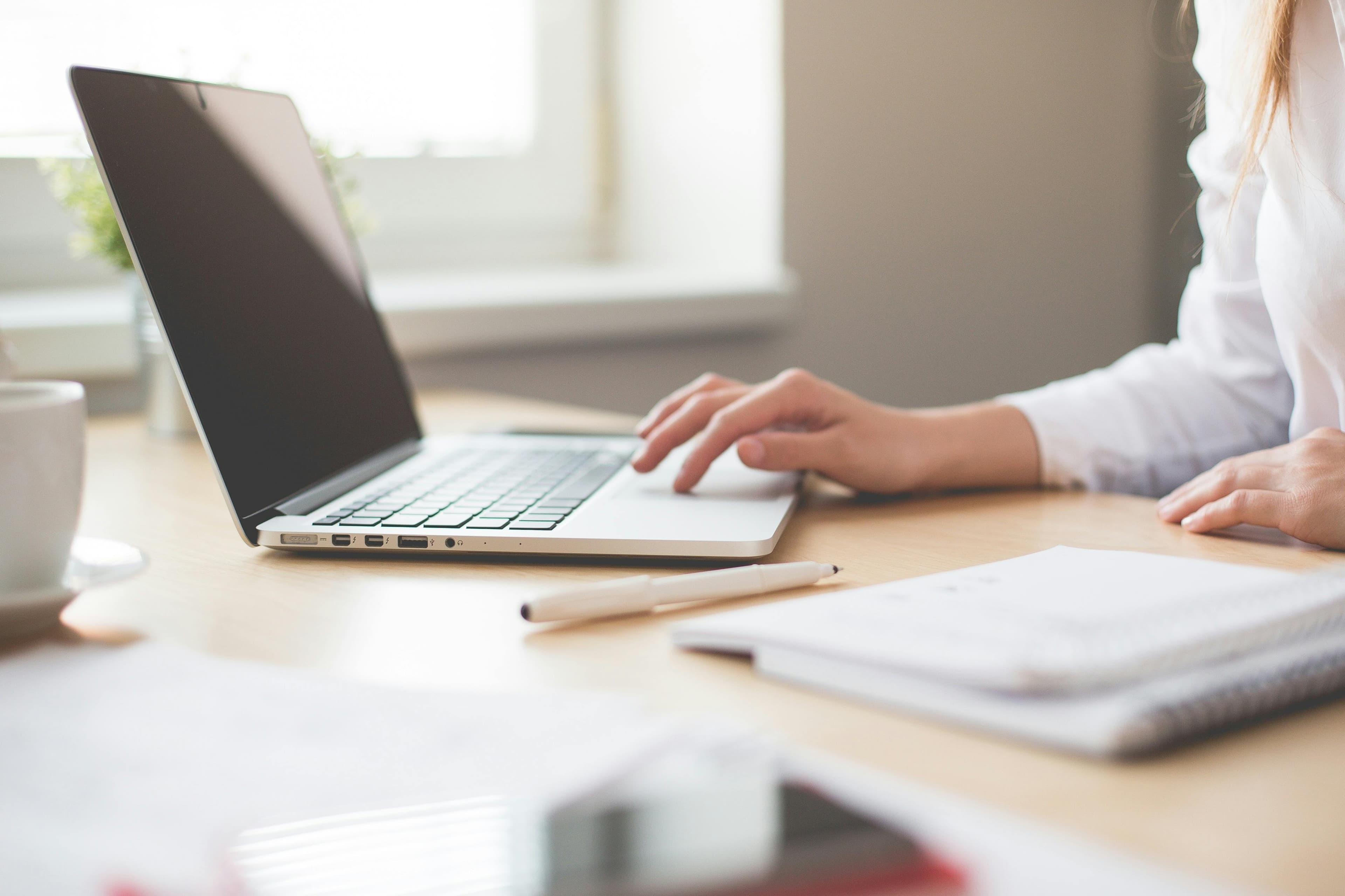 Resume with computer skills section highlighted on laptop screen